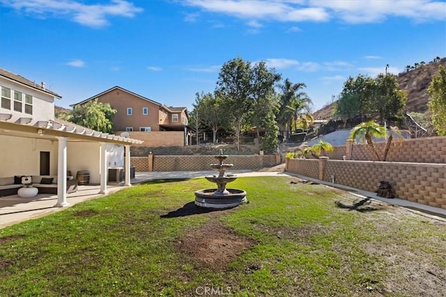 view of yard featuring cooling unit and a patio area