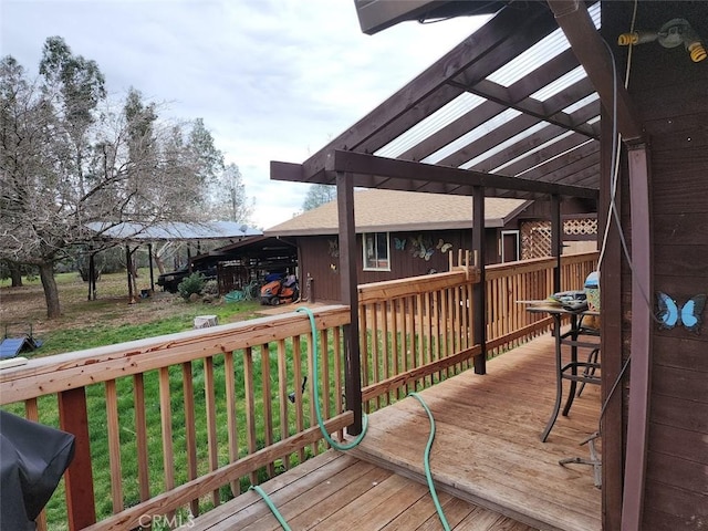 wooden deck with a yard