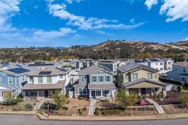 birds eye view of property featuring a mountain view