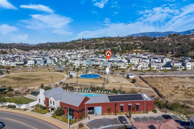 drone / aerial view featuring a mountain view