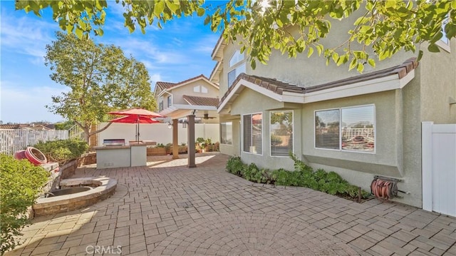 view of patio / terrace with exterior kitchen