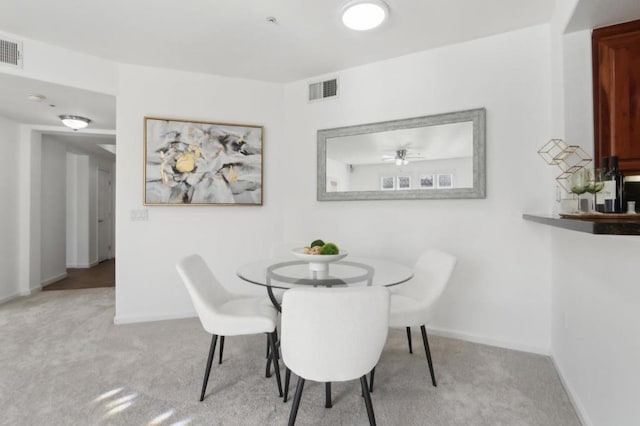 view of carpeted dining space