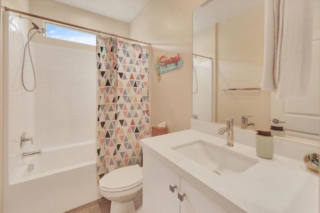 full bathroom featuring toilet, vanity, and shower / bath combo with shower curtain