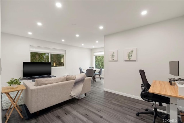 office area featuring dark wood-type flooring