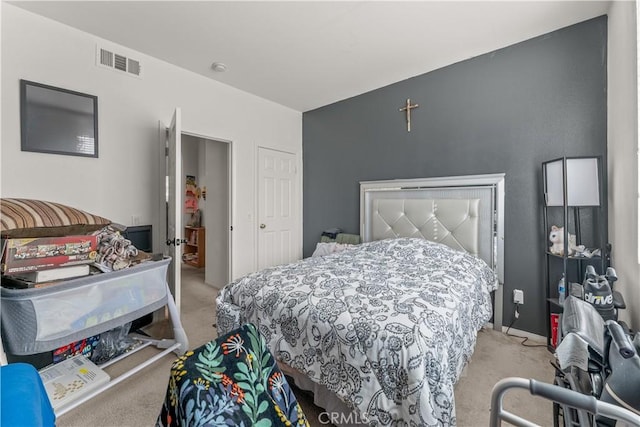 bedroom with light carpet