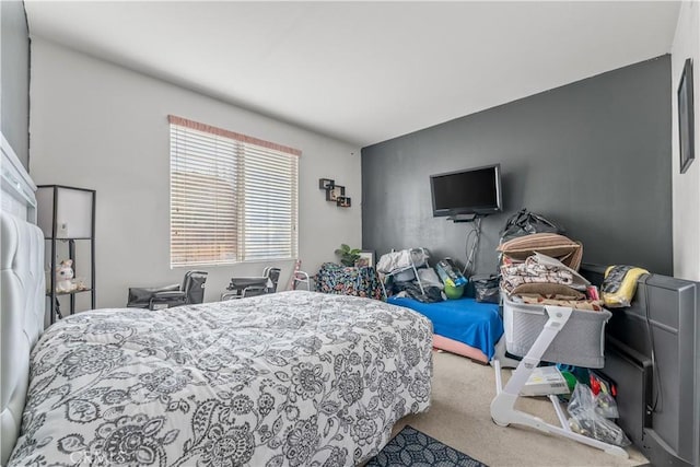 bedroom featuring carpet flooring