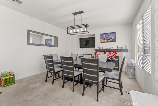 view of carpeted dining room