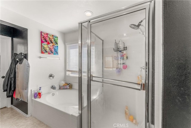 bathroom featuring plus walk in shower