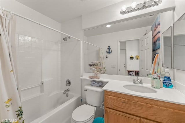 full bathroom with vanity, shower / bath combination with curtain, and toilet