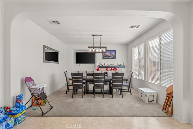 view of carpeted dining room