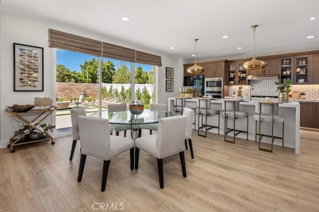 dining room featuring light hardwood / wood-style floors