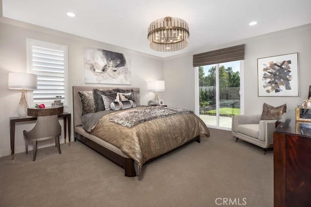 bedroom with access to exterior, ornamental molding, a notable chandelier, and carpet flooring