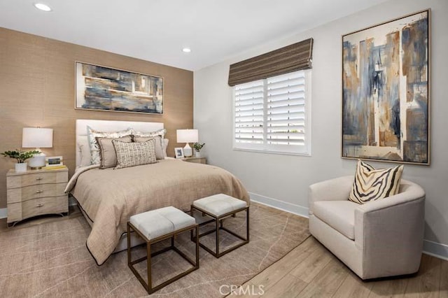 bedroom with light hardwood / wood-style flooring