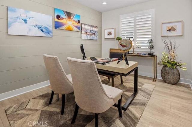 office with light hardwood / wood-style flooring