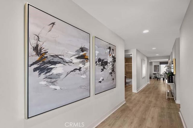 hallway featuring light hardwood / wood-style floors