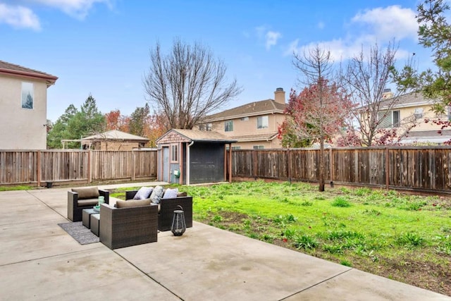 view of patio / terrace with an outdoor hangout area and a shed