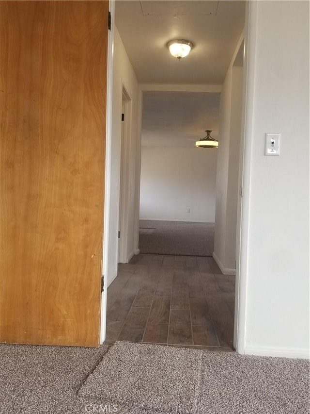 31072 Azurite Rd, Lucerne Valley, CA 92356 - corridor featuring baseboards and carpet floors