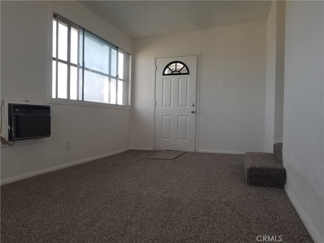 31072 Azurite Rd, Lucerne Valley, CA 92356 - foyer with baseboards, carpet floors, and a wall mounted AC