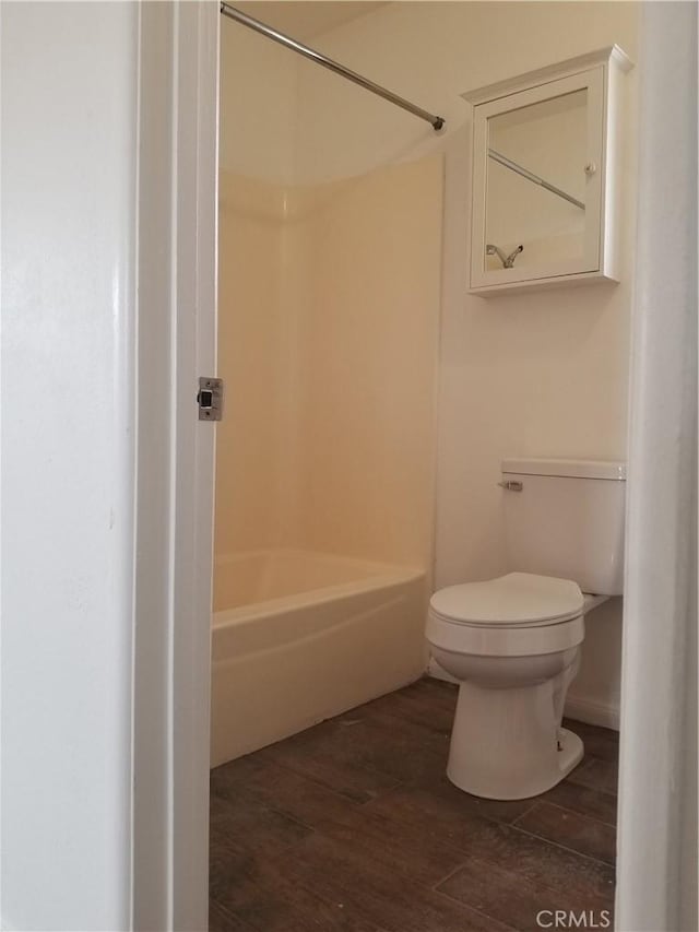 31072 Azurite Rd, Lucerne Valley, CA 92356 - full bathroom with toilet, wood finished floors, and washtub / shower combination