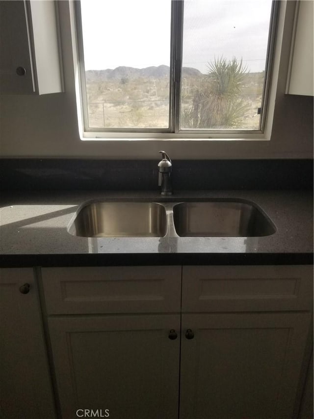 31072 Azurite Rd, Lucerne Valley, CA 92356 - kitchen featuring dark countertops and a sink