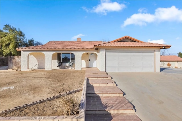 view of front of property with a garage