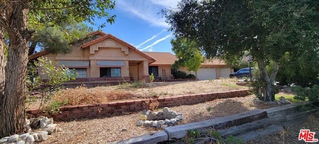 view of front of house with a garage