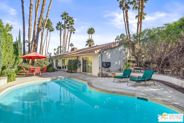 view of pool with a patio area