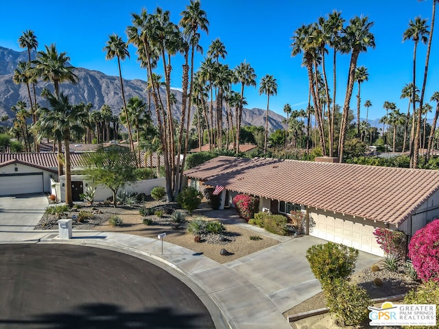 exterior space featuring a mountain view