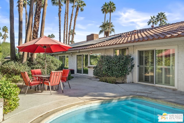 view of pool with a patio