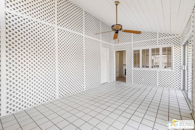 exterior space featuring ceiling fan, vaulted ceiling, and wood ceiling