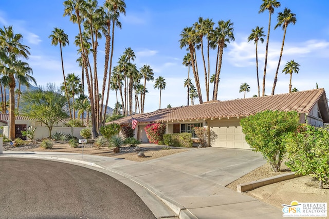 view of front of home with a garage