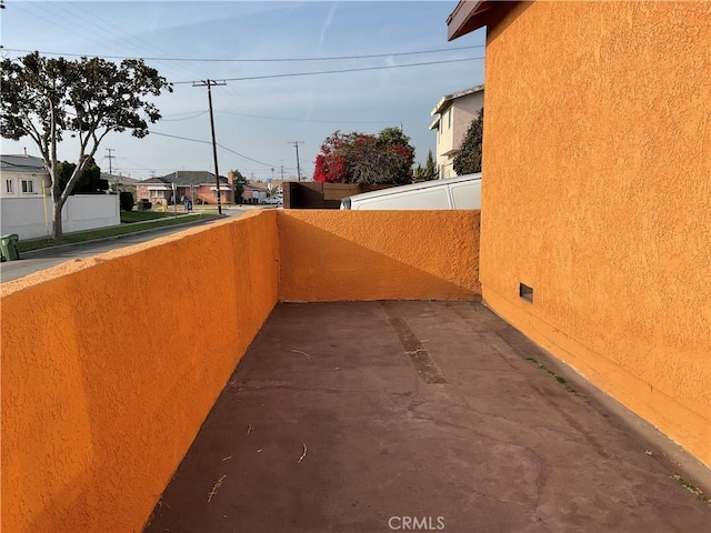 view of patio with a balcony