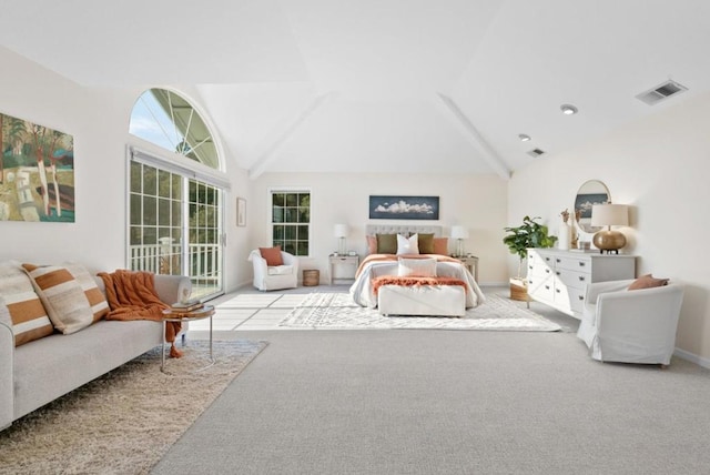 bedroom with light carpet, access to exterior, and high vaulted ceiling