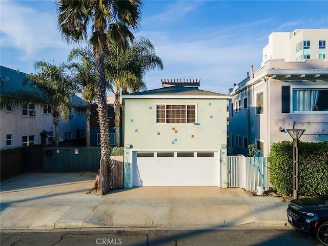 view of front of property featuring a garage