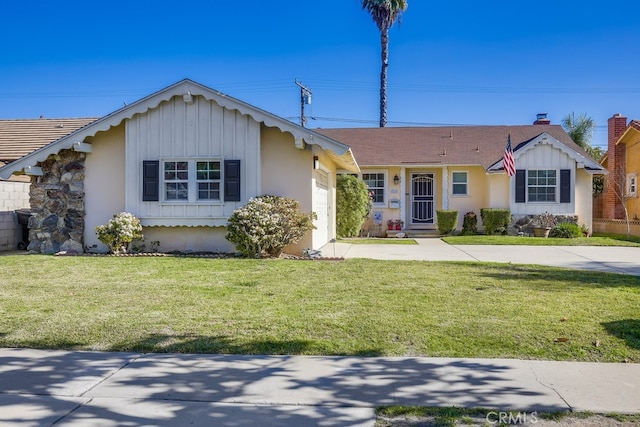 ranch-style house with a garage and a front yard