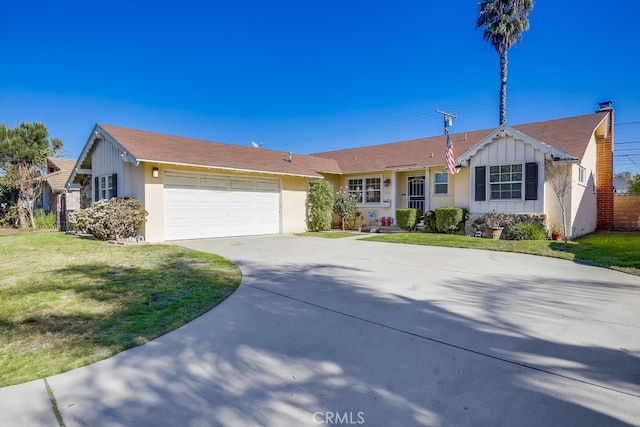 ranch-style house with a front lawn and a garage