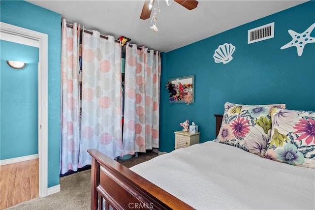 bedroom featuring ceiling fan and carpet flooring