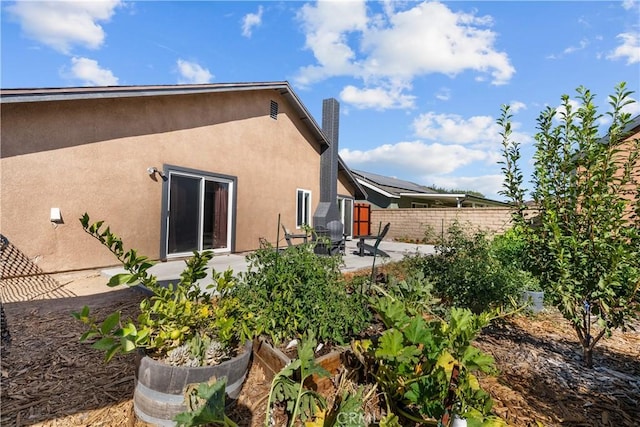 view of home's exterior with a patio area