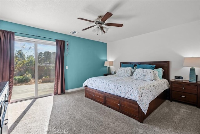 carpeted bedroom with ceiling fan and access to exterior