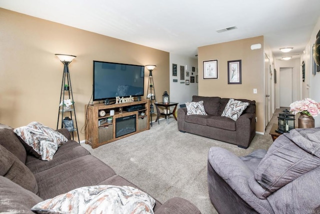 living room with light colored carpet