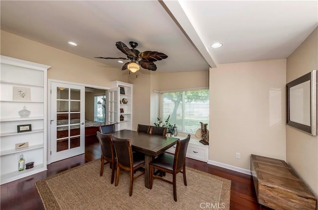 dining space featuring ceiling fan, french doors, and dark wood-type flooring