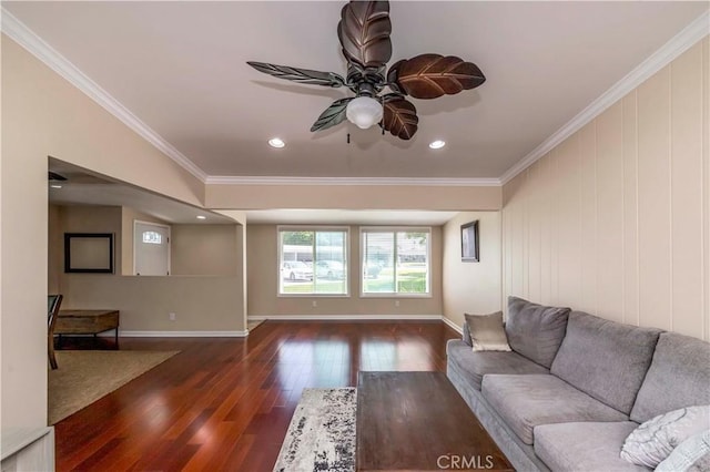 living room with ceiling fan, dark wood-type flooring, and crown molding