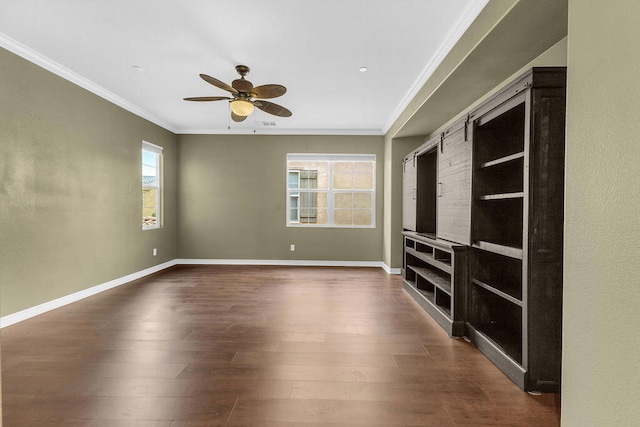 spare room with ceiling fan, hardwood / wood-style flooring, and ornamental molding