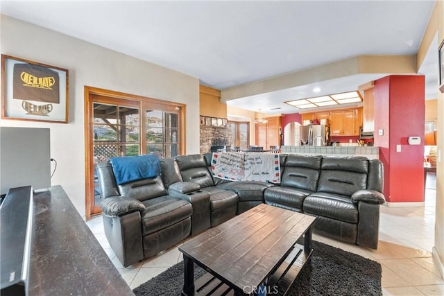 living room with light tile patterned floors