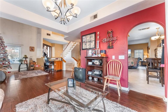 living room featuring an inviting chandelier