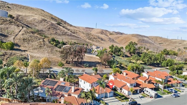 bird's eye view with a mountain view