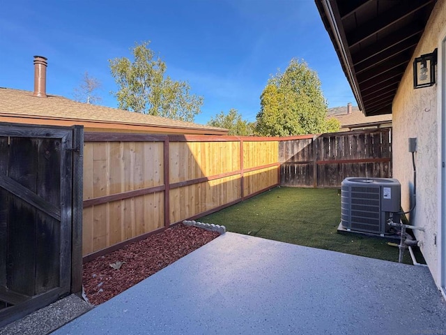 view of yard featuring a patio area and cooling unit