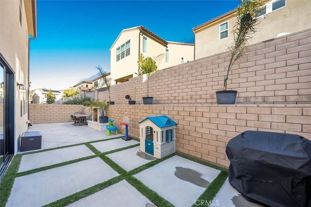 view of patio / terrace featuring a grill