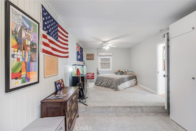 carpeted bedroom with ceiling fan