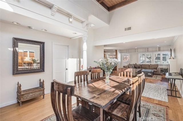 dining area with light wood-type flooring